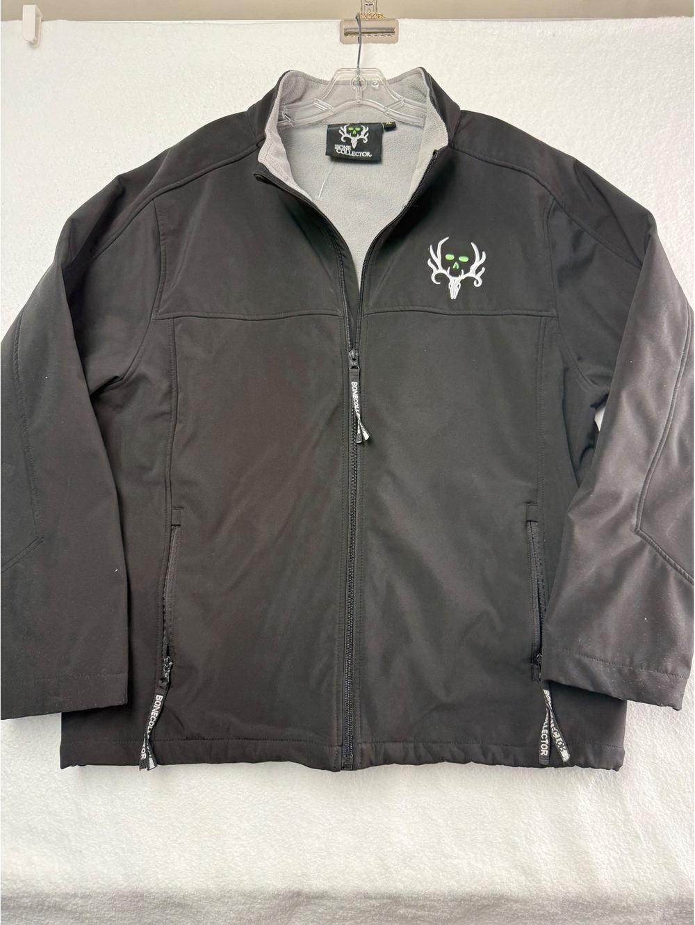 Bone Collector Men's XL Black and Gray Softshell Jacket with Green Skull Logo
